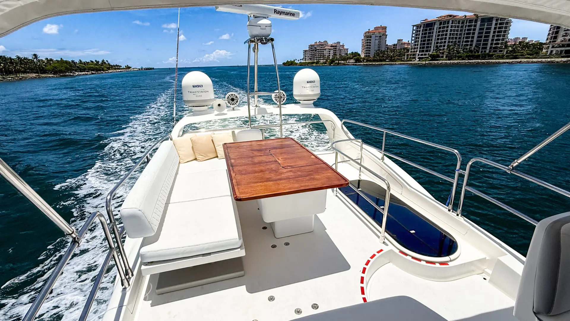 Aerial of yacht at bay